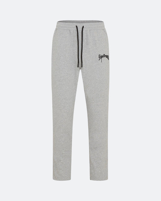 Grey joggers with 3D embroidered back logo against a white background
