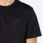 Close-up of the DopeDreamz Interlude Noir black premium T-shirt featuring the tonal black embroidered DDZ chest logo.
