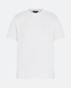 White DopeDreamz t-shirt with white 3D embroidered chest logo, front view on light background

