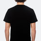 Back view of a model wearing a black t-shirt against a white background
