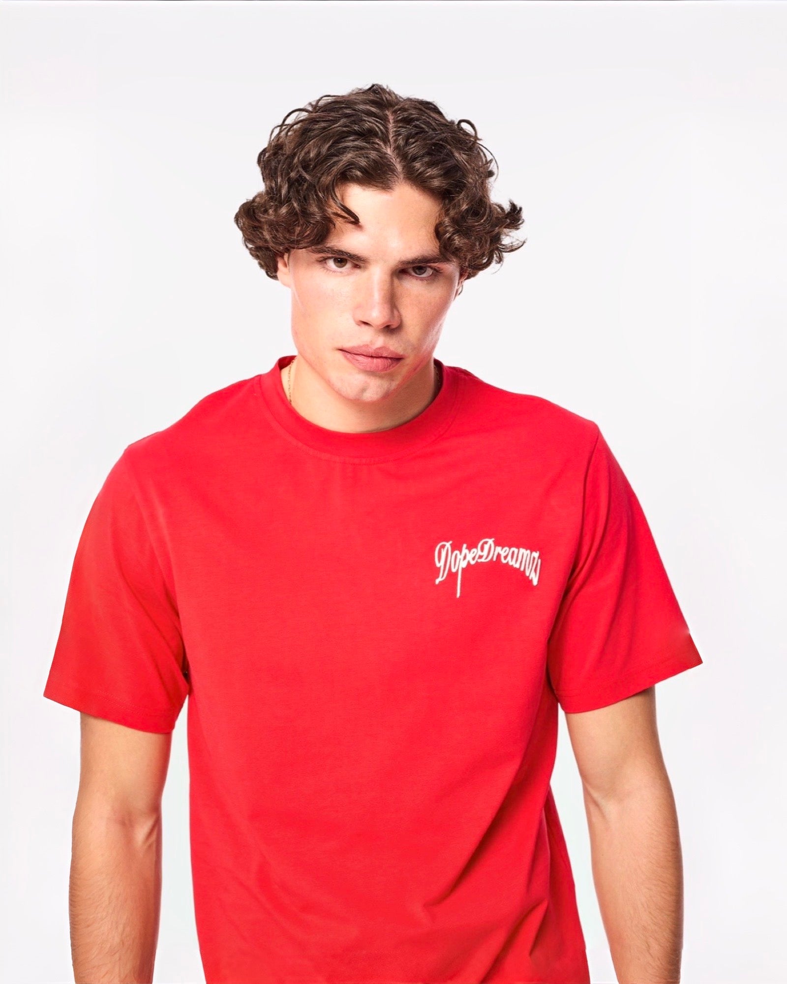 Red DopeDreamz t-shirt featuring white 3D chest embroidery, front view on white background
