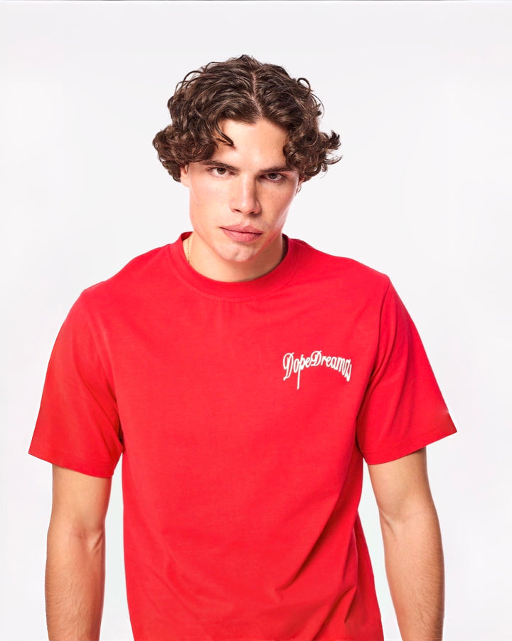 Red DopeDreamz t-shirt featuring white 3D chest embroidery, front view on white background