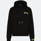 Black hoodie with neon 3D embroidered logo on the chest against a light background

