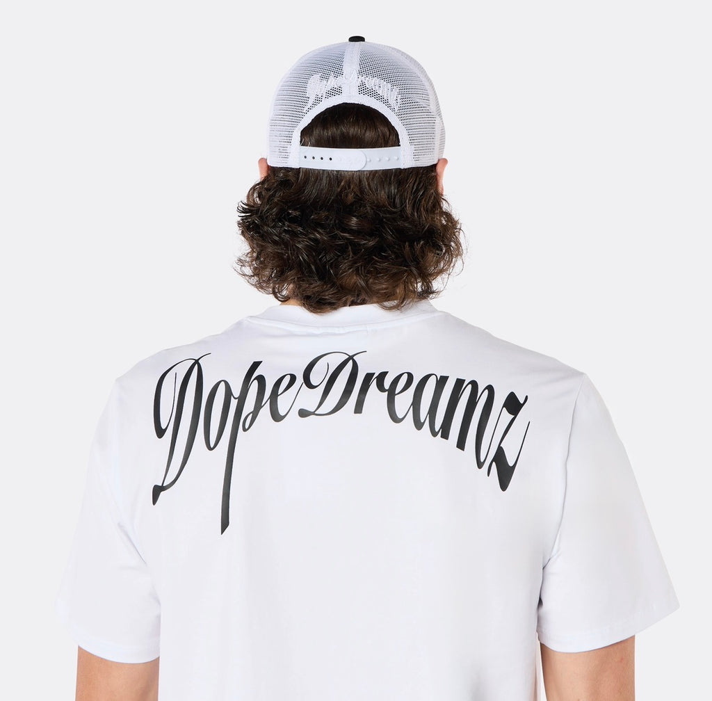 Close-up back view of the DopeDreamz Interlude Noir white premium T-shirt featuring the black DopeDreamz back graphic.