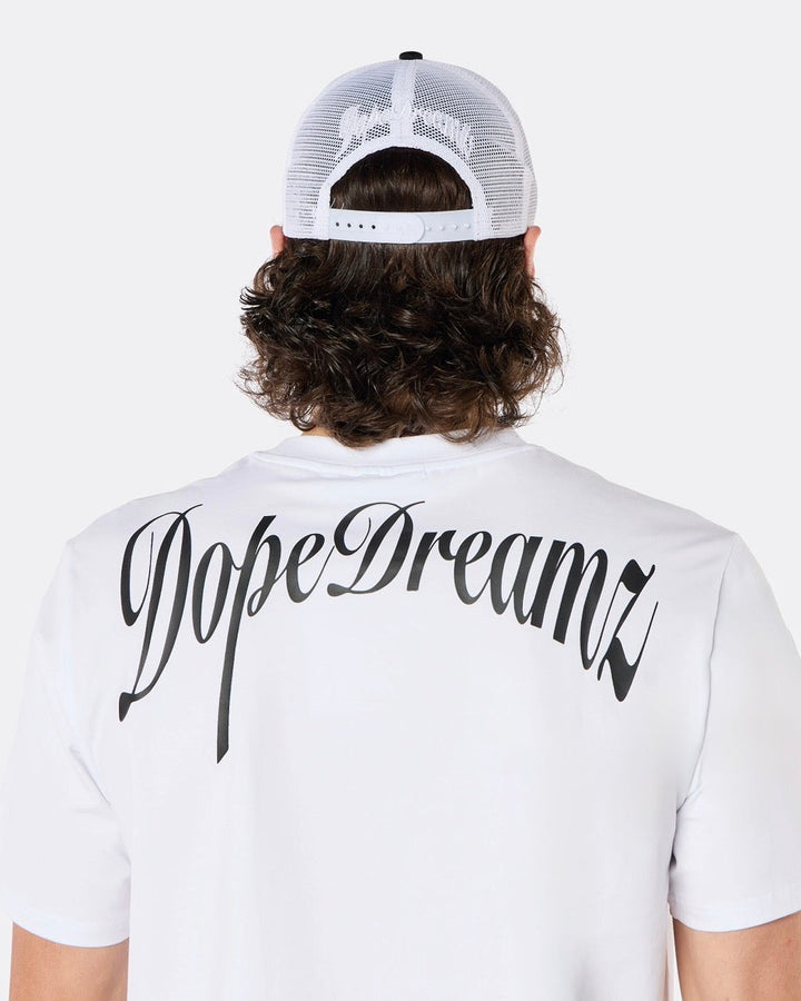 Close-up back view of the DopeDreamz Interlude Noir white premium T-shirt featuring the black DopeDreamz back graphic.