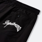     Black DopeDreamz Interlude Noir shorts detail of back pocket with white embroidered DopeDreamz logo and branded button