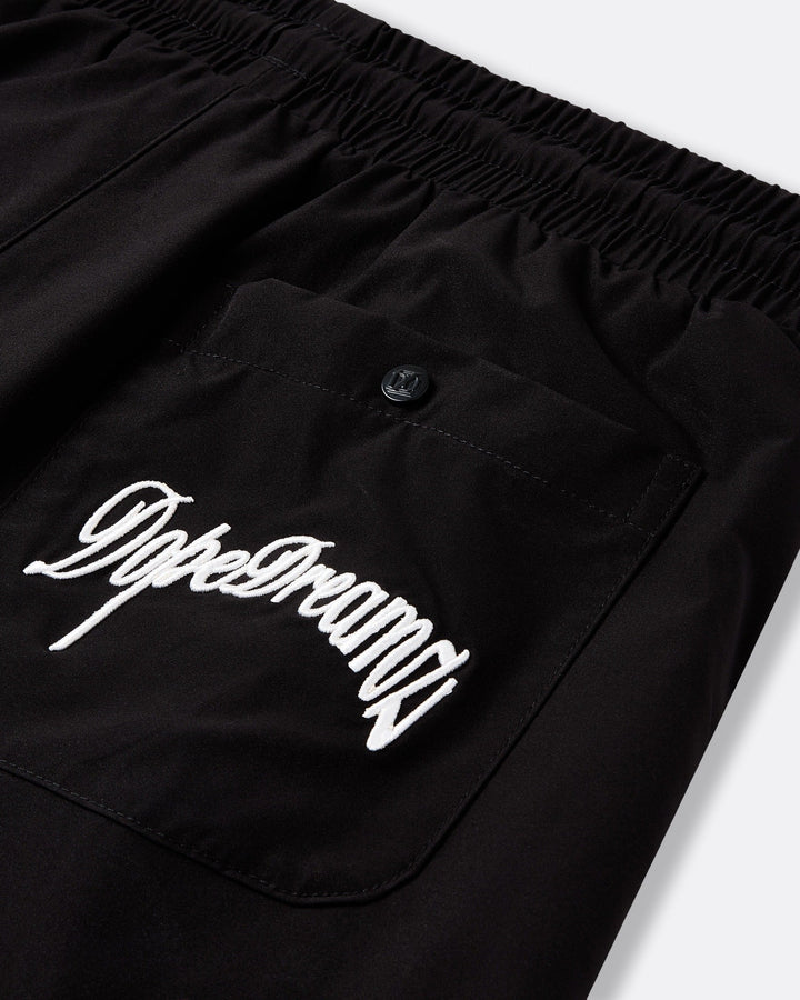     Black DopeDreamz Interlude Noir shorts detail of back pocket with white embroidered DopeDreamz logo and branded button