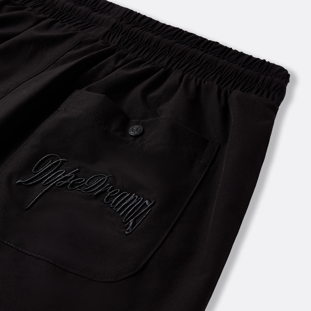 Black DopeDreamz Interlude Noir shorts detail of back pocket with embroidered DopeDreamz logo and branded button