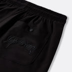 Black DopeDreamz Interlude Noir shorts detail of back pocket with embroidered DopeDreamz logo and branded button