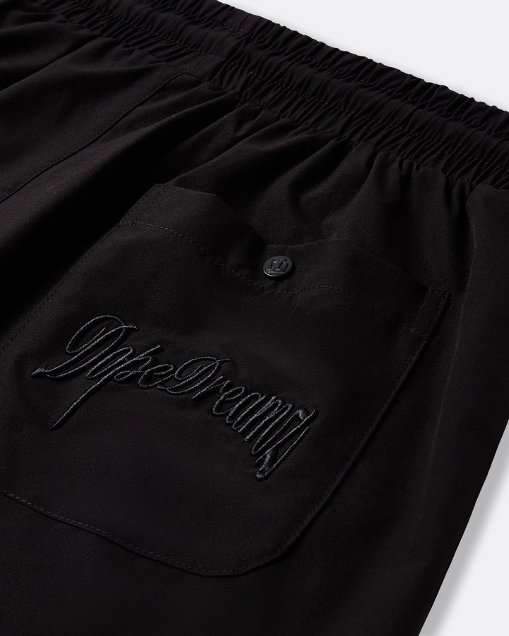 Black DopeDreamz Interlude Noir shorts detail of back pocket with embroidered DopeDreamz logo and branded button