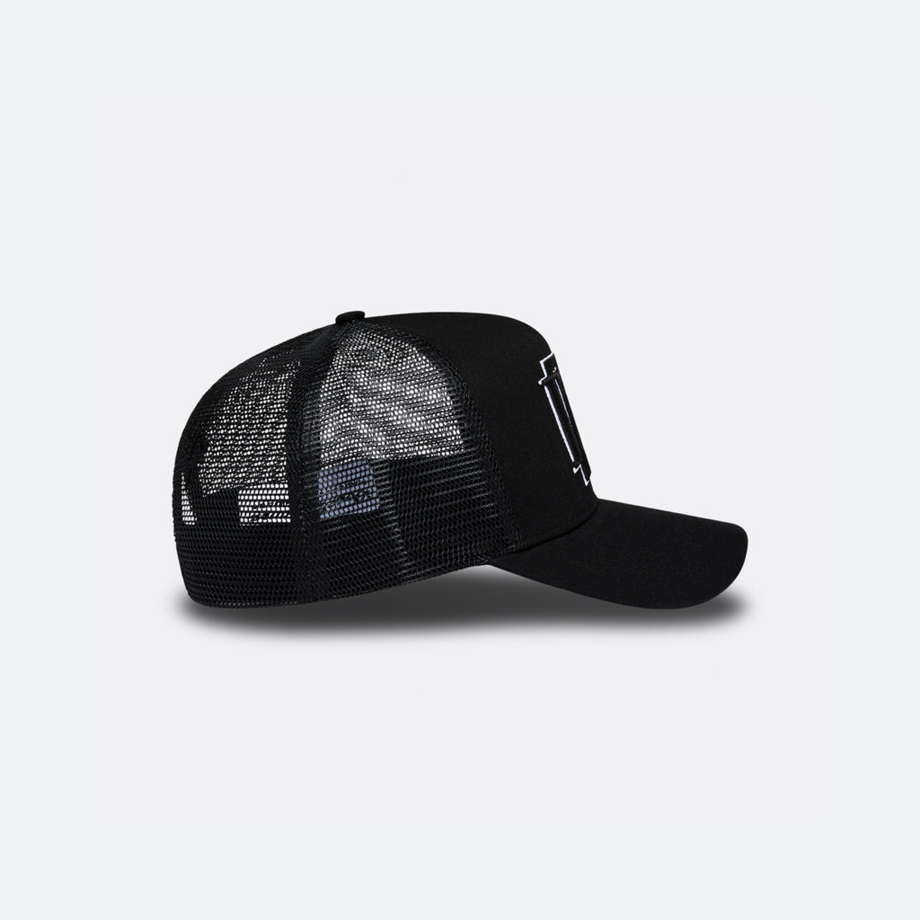 Black DopeDreamz Interlude Noir trucker cap side view with black mesh panels