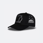 Black DopeDreamz Interlude Noir trucker cap angled front view with black embroidered DDZ logo