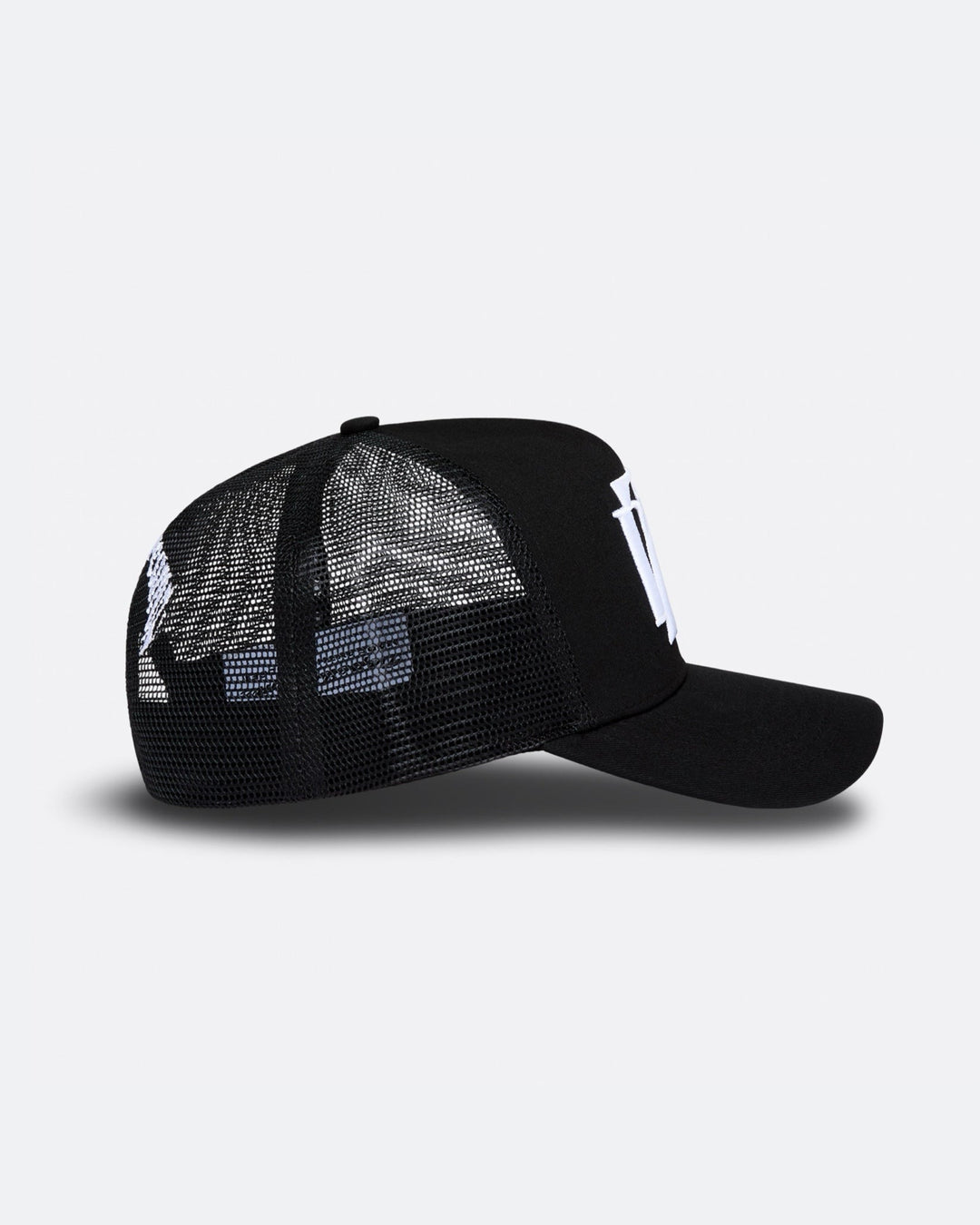 Black DopeDreamz Interlude Noir trucker cap side view with black mesh panels