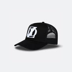 Black DopeDreamz Interlude Noir trucker cap angled front view with white embroidered DDZ logo
