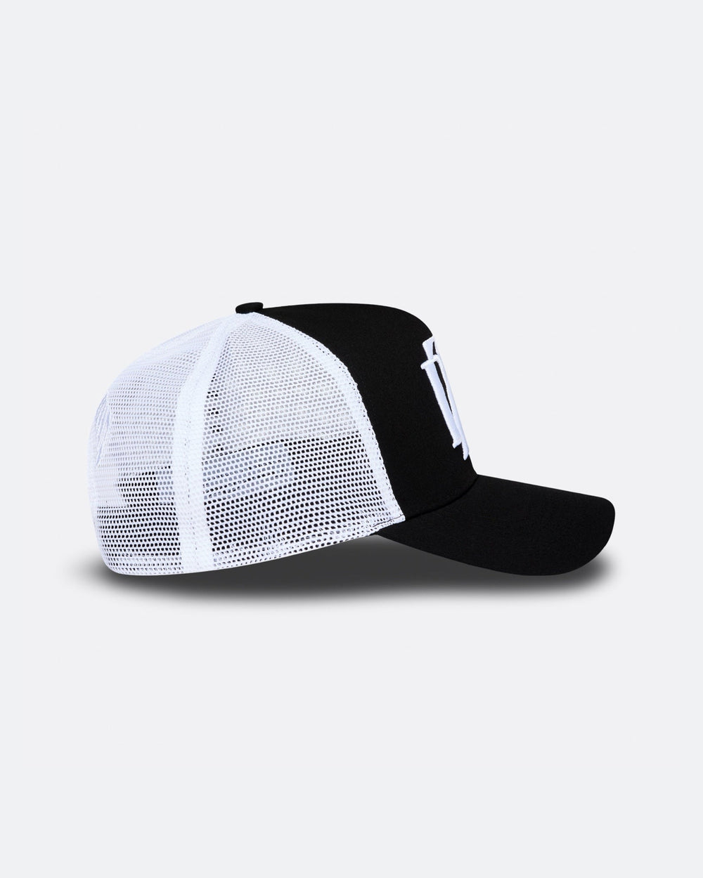  Black and white DopeDreamz Interlude Noir trucker cap side view with white mesh panels