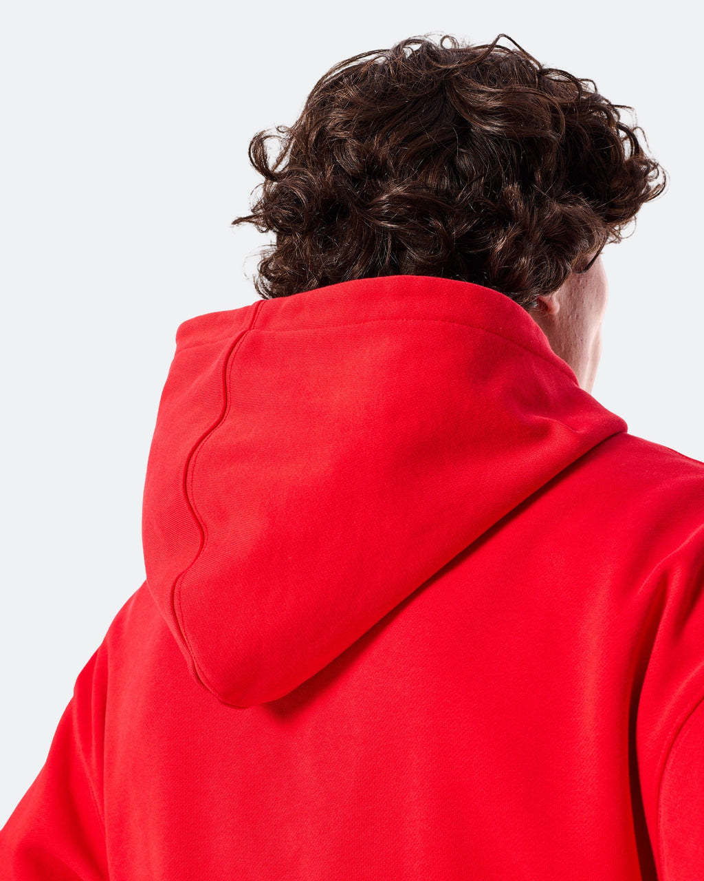 Back view of red DopeDreamz hoodie showing structured hood design
